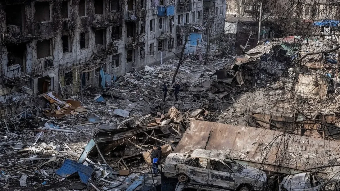 people-stand-at-the-site-of-an-apartment-building-hit-by-a-russian-missile-strike-amid-russia-s-attack-on-ukraine-in-the-town Ukranine